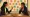 Two women working on a canvas with post-it notes.